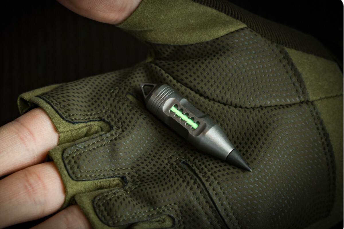 Tiny titanium Mr. Gadget multitool lets you scribble, screw, and more